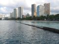 Wave breaker along waikiki beach